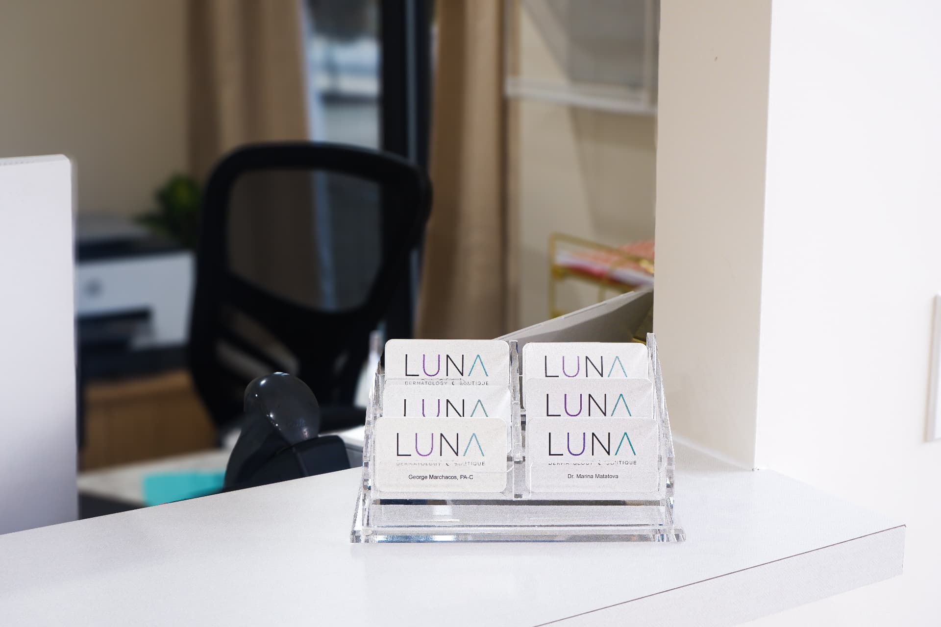 Branded business cards at reception